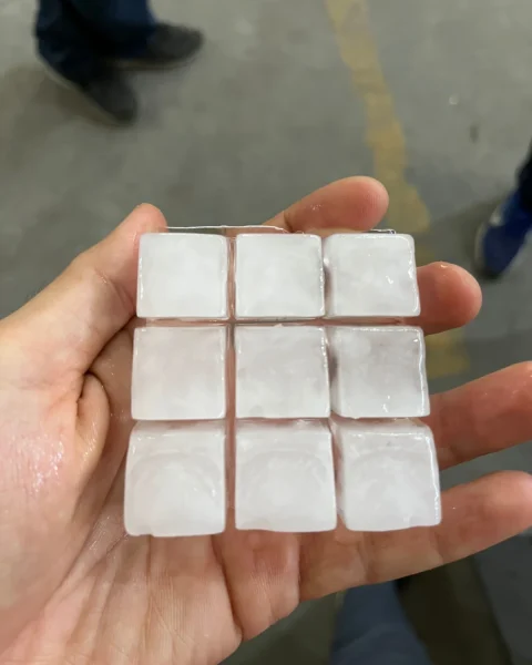 A 3×3 block of ice cubes in the hand