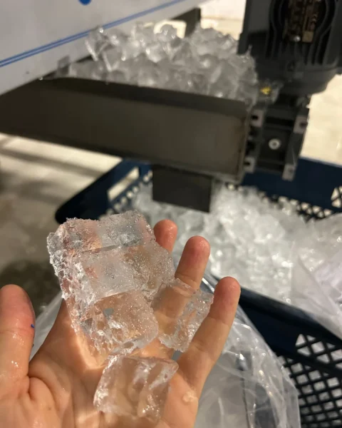 Clear ice cubes at the machine discharge